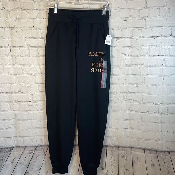 Zoe + Liv Pants - Zoe + Liv Women’s Black‎ Joggers, Size xs, Beauty in every shade written on leg